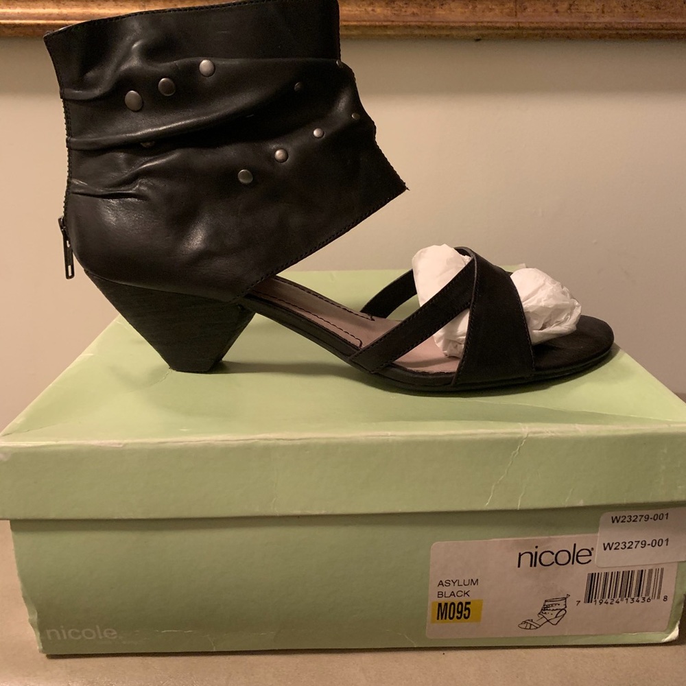 Black leather sandal/booties by Nicole.